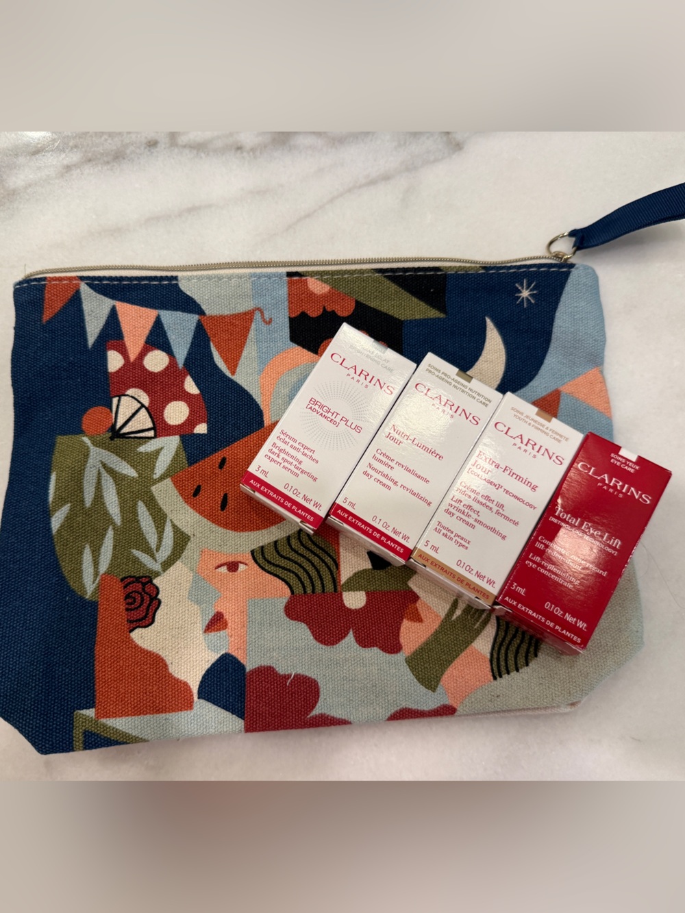 Clarins sample set with makeup bag